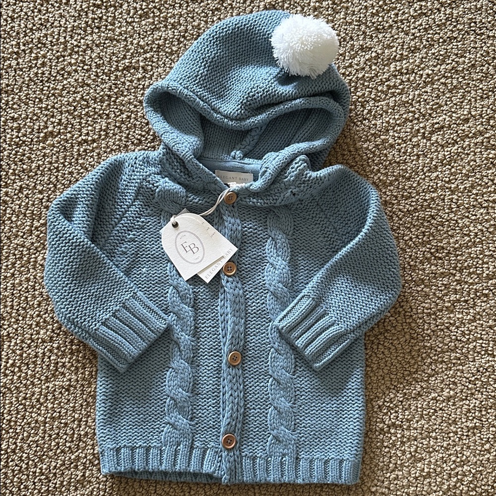 Elegant baby Blue Hooded Baby Cardigan with Pom Pom hood size 9-12mth